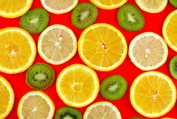 Fototapeta na wymiar Background texture-fruit mix on red background.