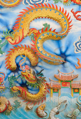 Dragon sculpture chinese style on wall in the Chinese temple
