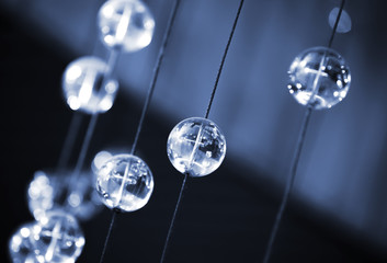 Abstract dark blue background with glass spheres