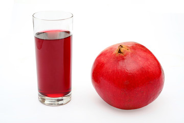 Pomegranate fruit and glass of juice