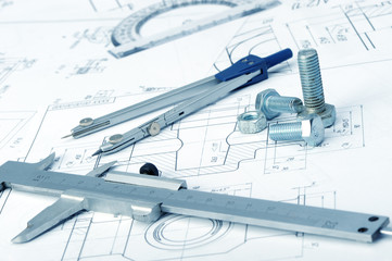 The plan industrial details, a screws, caliper, divider. A photo