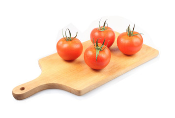 tomatoes on a wooden worktop