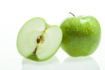 Green apple and slice