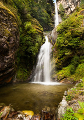 Fototapeta na wymiar Waterfall in Himalayas: beautiful landscape