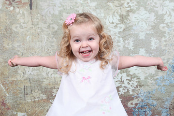 Little Girl on Suitcase