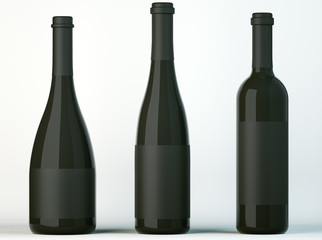 Three corked bottles for wine with black labels