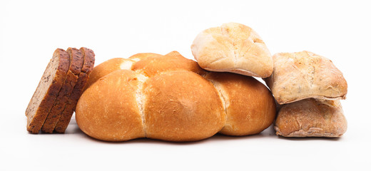 assortment of baked bread isolated on white background