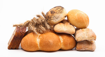 assortment of baked bread isolated on white background