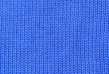 Background - closeup of blue knitted cotton textile