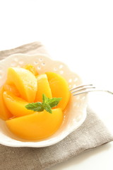 freshness peach on bowl with mint for gourmet dessert