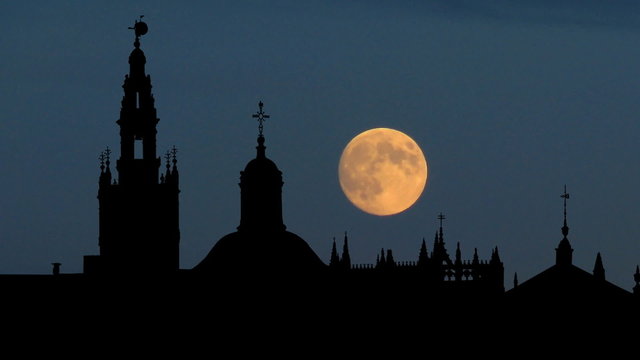 Spain Seville Cathedral and Giralda Tower moonrise