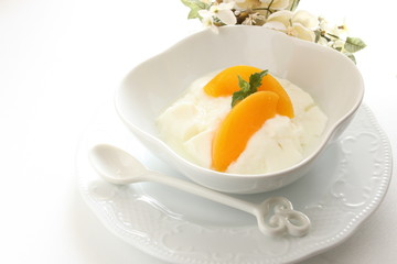 peach and yogurt with mint for gourmet dessert image