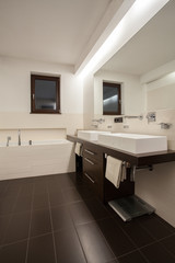 Travertine house - beige bathroom