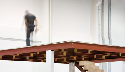 The builder checks the mezzanine floor