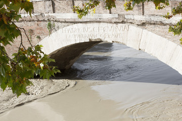 Details of Pons Fabricius and a flooded Tiber, Rome, Italy