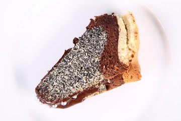 Slice of a bundt cake with chocolate & sugar balls
