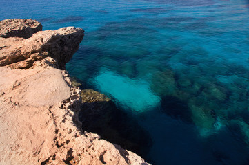 Fototapeta na wymiar Sea landscape with rock. Capo Greco, Cyprus