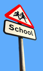 school warning sign on blue sky background