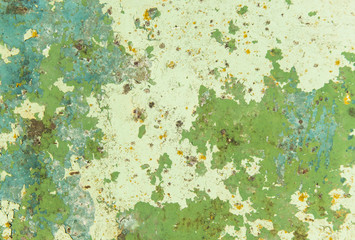 Obraz na płótnie Canvas Weathered and grungy green metal surface
