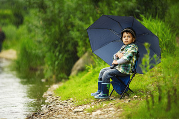 little boy with umbrella
