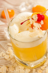 Yellow drink with almonds and apricots