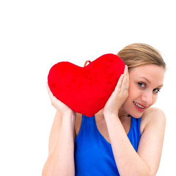 woman holding a red heart