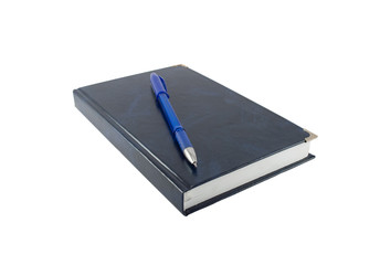 The pen lying on a notebook