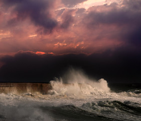 Storm under red sunset