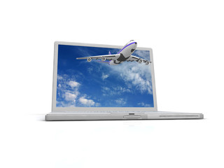 Professional Laptop and flying jet airplane