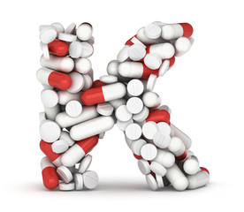 Letter K, alphabet from pills