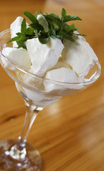 White ice cream with mint leaves