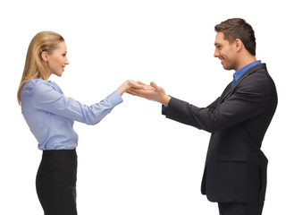 man and woman showing something on the palms