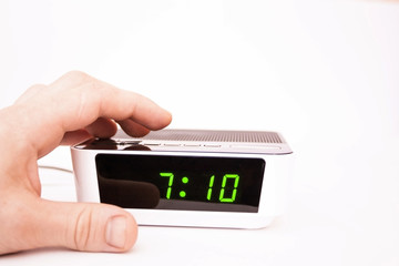 Contact of a hand of an alarm clock