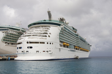 Two Luxury Cruise Ships Under Cloudy Sky