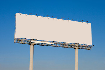 billboard against blue sky
