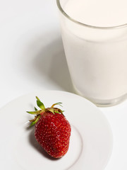 Glass of milk and strawberry
