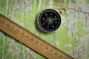 Compass and ruler on a road map