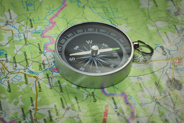 Compass on a road map