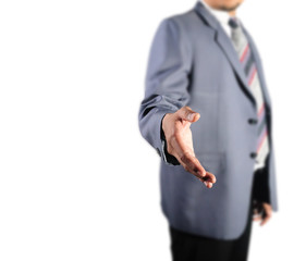 Business man standing for handshake isolated on white