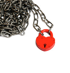 Red heart in a lock, put in a chain. Is isolated.