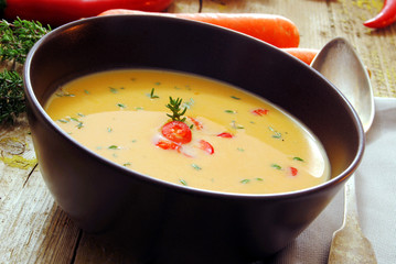 Carrot soup with thyme, vegetable  and vegetarin meal