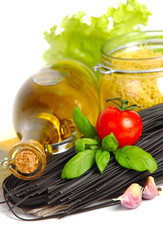 Italian Pasta with vegetables in wooden plate isolated on white.