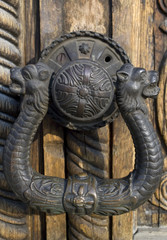 Ornate wooden doors, door hardware of Aleksandar Nevski church