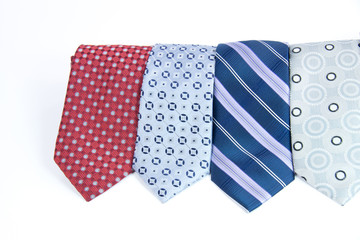 Selection of silk ties isolated on white