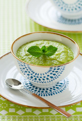 A thick vegetable soup with mint