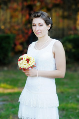 Beautiful young bride, portrait outdoors