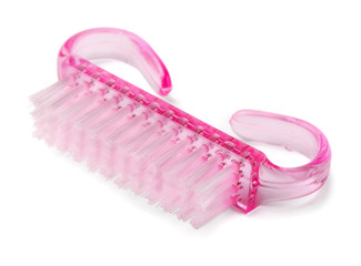 Pink plastic nail manicure brush