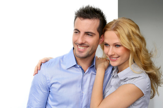 Portrait Of Cheerful Couple Looking Away