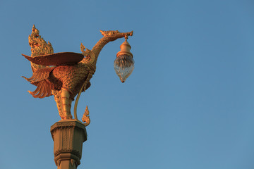 Statue of birds in Thai literature on pillar lantern