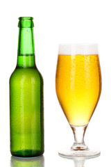 Bottle and glass of beer isolated on white